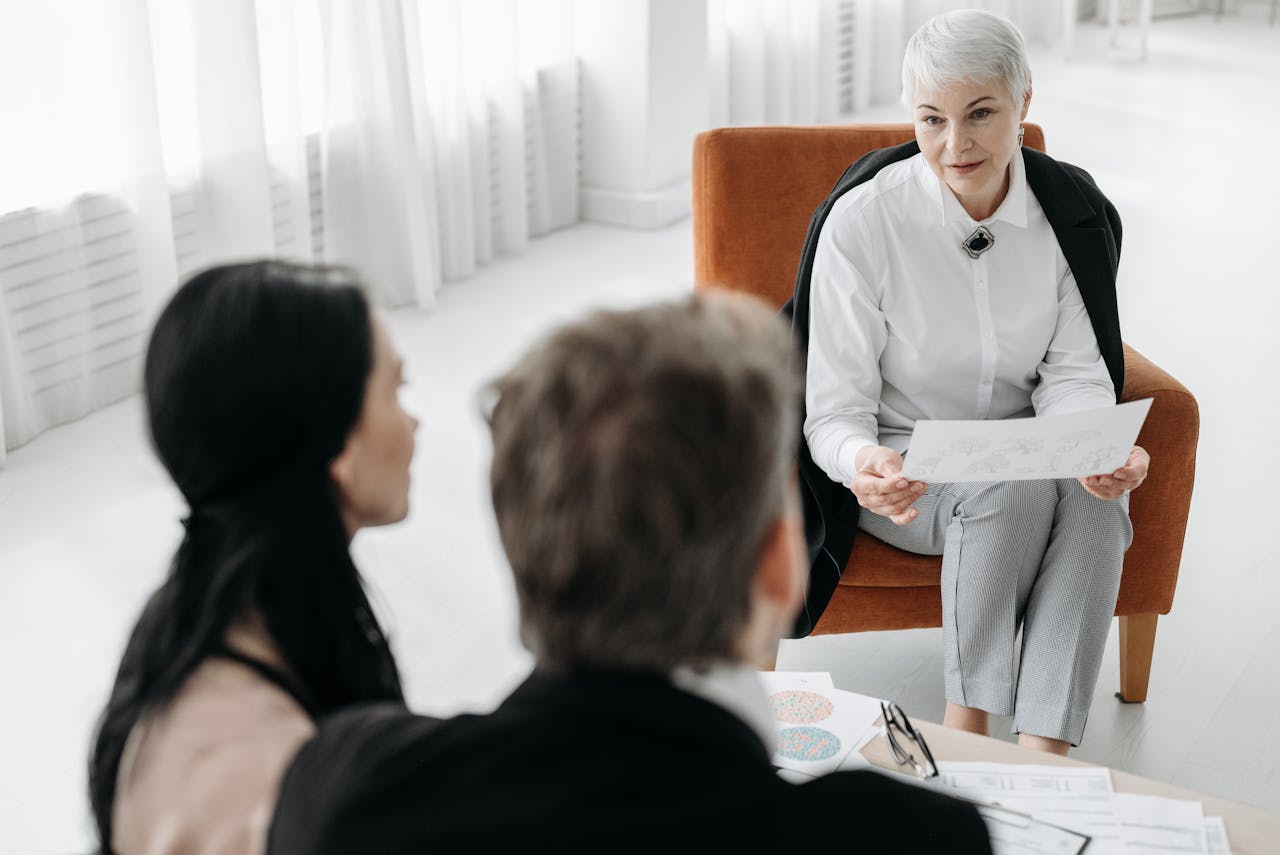Social Worker Discussing the Psychological Tests She Must Conduct